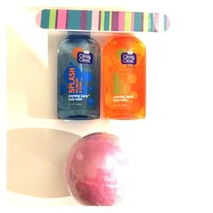 An orange and blue soap, bathbomb, and nail file.